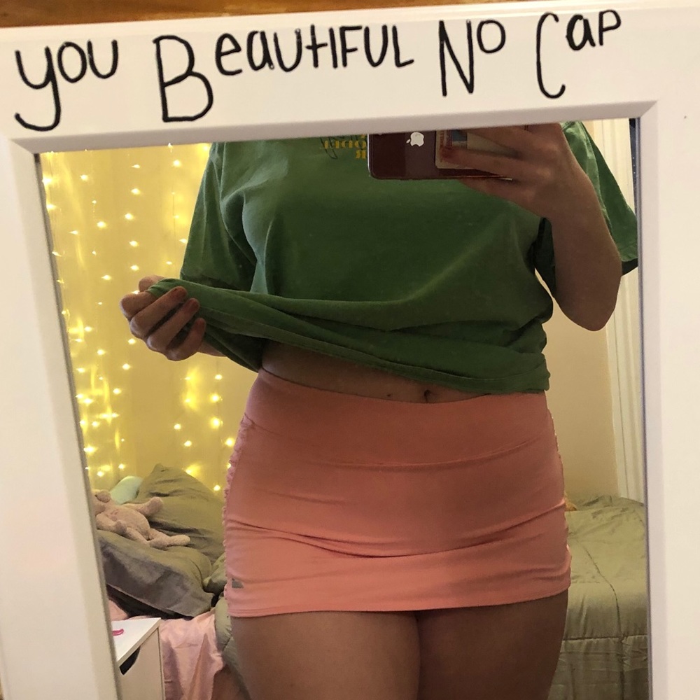 Pink athletic skirt with build in shorts